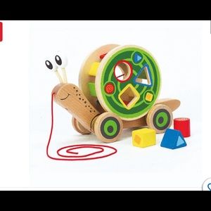 Hape walk a long wooden snail brand new in the box